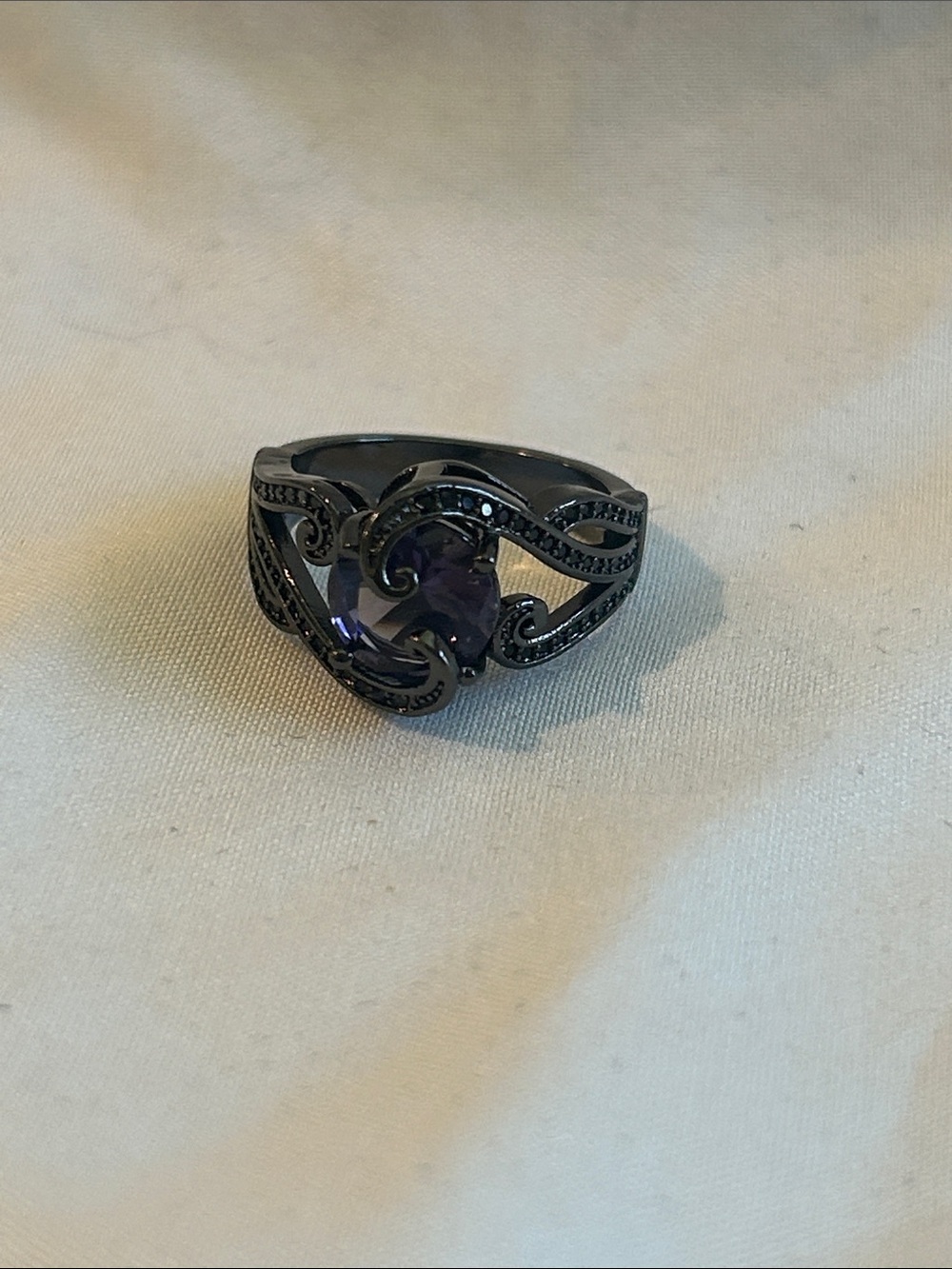 Black Vintage-Style Swirl Ring with Purple Stone